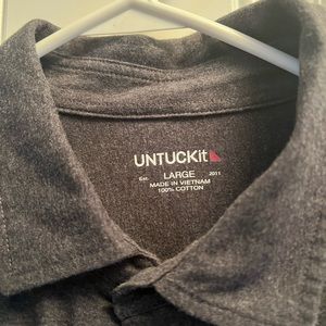 Long sleeve Untuck it shirt.